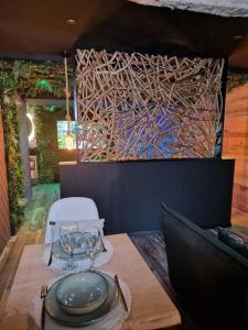 Appartements Appartement La Cabane jacuzzi : photos des chambres