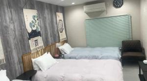 難波梅田地铁直达距离地铁站步行5分钟双床间私人浴室家庭式民宿