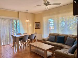 House in Roses with Waterfront Views