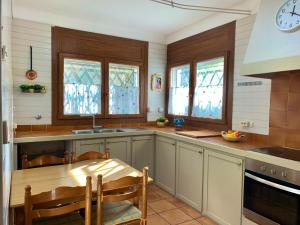 House in Roses with Waterfront Views