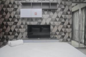 Comfy and Tranquil 2BR The Mansion Kemayoran Apartment near JIEXPO By Travelio