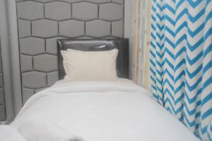 Comfy and Tranquil 2BR The Mansion Kemayoran Apartment near JIEXPO By Travelio