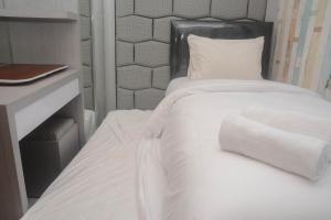 Comfy and Tranquil 2BR The Mansion Kemayoran Apartment near JIEXPO By Travelio