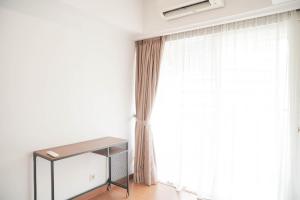 Good Place 2BR Apartment at Sudirman Tower Condominium By Travelio