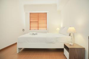 Good Place 2BR Apartment at Sudirman Tower Condominium By Travelio