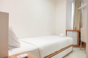 Comfort 2BR at The Mansion Kemayoran Apartment By Travelio