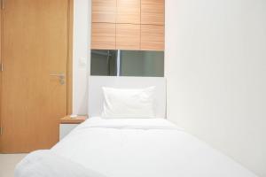 Comfort 2BR at The Mansion Kemayoran Apartment By Travelio