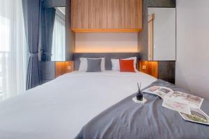 Good Deal and Homey 1BR (without living room) Bintaro Embarcadero Apartment By Travelio