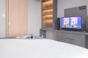 Good Deal and Homey 1BR (without living room) Bintaro Embarcadero Apartment By Travelio