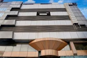 Super Townhouse Oak JM Road formerly Krishna presidency - Yerandwane