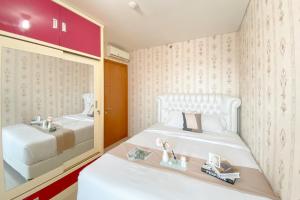 Strategic and Comfort Stay 2BR Apartment Woodland Park Residence By Travelio