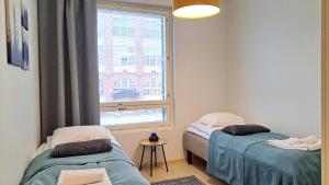 Kotimaailma Apartments, moderni saunallinen & parvekkeellinen kolmio, Tammela