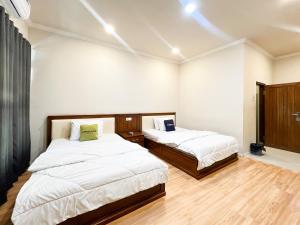 Phòng Hai Giường Đơn Loại Sang (Deluxe Twin Room)