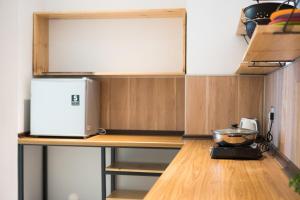 ZOOSO 住所 Apartment 1310 Emporium