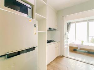 Simply and Modern Look 1BR at Tree Park City BSD Apartment By Travelio