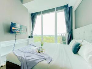 Simply and Modern Look 1BR at Tree Park City BSD Apartment By Travelio