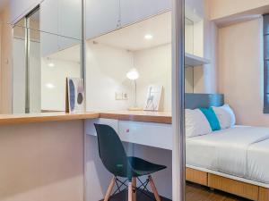 Comfort and Strategic 2BR Bassura City Apartment By Travelio