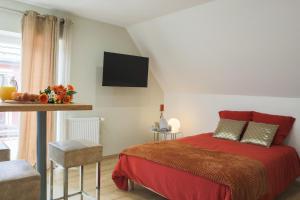 Appartements La Suite Allure : photos des chambres