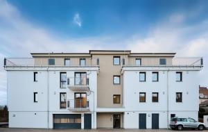 Moderne Apartments mit Highspeed-WLAN und Gratis-Tiefgarage Ihr perfekter Rückzugsort nahe dem Zentrum und der Therme I BARRIEREARM