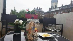 Appartements Terrasse vue cathedrale et beffroi hyper centre : photos des chambres