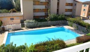 Appartements Studio avec piscine et jardin : photos des chambres