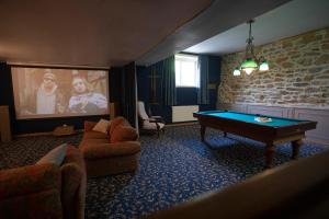 Lodges Manava Villa vue mer et Mont Saint Michel piscine interieure : photos des chambres