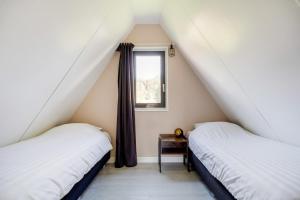 Buizerd I Huisje in Noordse Stijl met Tuin