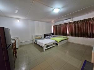 ห้องใหญ่-ห้องพักรายวัน เมืองทองธานี เรือนศรีตรัง