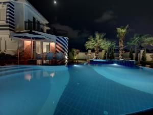 RED PREMIUM VIP CUSTOM DESIGN VILLA WITH TURKISH BBQ+PRVT SWMG POOL