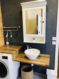 Appartements Meubles de l'Arsenal coeur de ville ! : photos des chambres