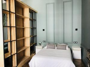 Appartements Meubles de l'Arsenal coeur de ville ! : photos des chambres