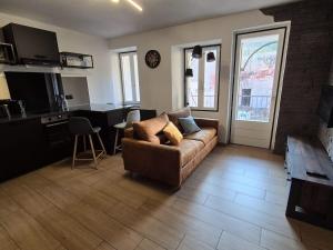 Appartements T2 avec balcon expo sud en plein centre ville : photos des chambres