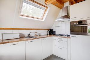 Tjiftjaf I Huisje met Uitzicht op Ruime Tuin