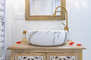 Appartements Le Nid d'Eliyah, suites avec jacuzzi 15min Disneyland Paris : photos des chambres