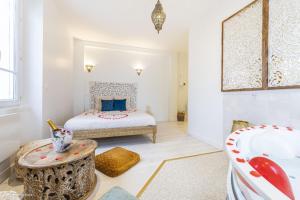 Appartements Le Nid d'Eliyah, suites avec jacuzzi 15min Disneyland Paris : photos des chambres