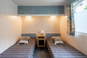 Campings Mobilhome Mh75 La Tremblade : photos des chambres