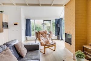 Grote Bonte Specht I Moderne Bungalow aan Bosrand