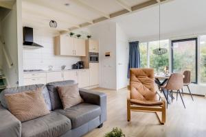 Grote Bonte Specht I Moderne Bungalow aan Bosrand