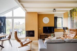 Grote Bonte Specht I Moderne Bungalow aan Bosrand