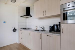 Grote Bonte Specht I Moderne Bungalow aan Bosrand