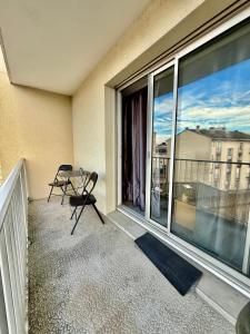 Appartements T1 aux pieds de la Gare Benedictins - DABNB : photos des chambres