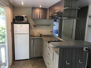 Campings Camping 4 etoiles - Piscine - ef0ihh : photos des chambres