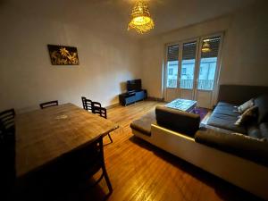 Appartements Huitieme Avenue Grand Parking Un Sejour a Part : photos des chambres