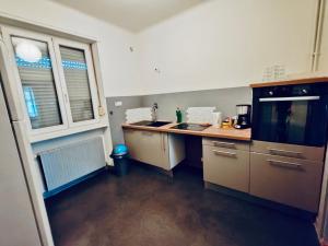 Appartements Huitieme Avenue Grand Parking Un Sejour a Part : photos des chambres