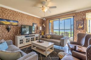 Live in Paradise with Golf Tennis Gym Pools and More!