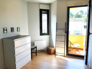 Appartements Le Cedre, appartement avec garage : photos des chambres