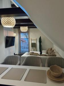 Apartamentai ant marių kranto