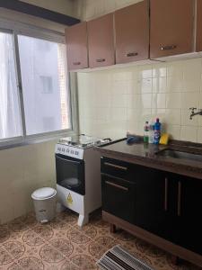 PRAIA GRANDE-Ocian 10 pessoas Pé na areia