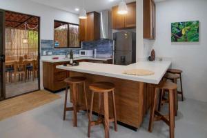 Minimalist Condo with a Beautiful New Design, Bound Patio, and Shared Community Pool