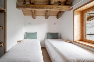 La ferme d'Hauteluce - Chalets : photos des chambres